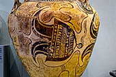 Archaeological Museum of Heraklion. Helmet used as a decorative motif on a 3-handled amphora at Katsamba,  (Late Bronze Age, 1425 - 1400 BC) 